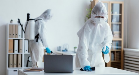 Office Pest Control Sydney promotional banner featuring a modern office workspace with signs of pest activity and a professional pest control technician inspecting the area. The design emphasizes safe, reliable, and effective office pest management solutions for Sydney businesses.